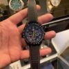 ساعه من OMEGA 007 تعمل بعدادات بلون اسود وسير جلد اسود