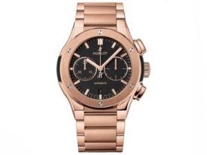 ساعه من Hublot تعمل بعدادات بلون اسود وسير دهبي من المعدن