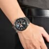 ساعه من Casio تعمل بعدادات بلون اسود وسير فضي من المعدن