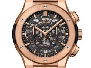 ساعة من Hublot تعمل بعدادات بلون اسود وسير دهبي من المعدن