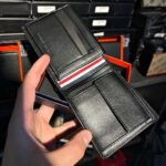 محفظة تومي هيلفيغر جلد طبيعي اسود