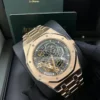 ساعة ِAudemars Piguet تعمل بعدادات بلون اسود  وسير نحاسى من المعدن