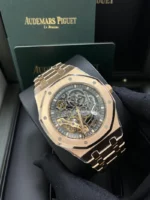 ساعة ِAudemars Piguet تعمل بعدادات بلون اسود وسير نحاسى من المعدن