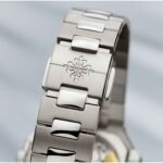 ساعة باتيك فليب استيك معدن فضي - من الاستيك