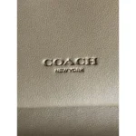 محفظة موبايل كوتش COACH حريمي سيجنتشر بسوار معصم CW780
