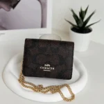 محفظة كوتش COACH ميني بسلسلة سيجنتشر موديل CZ278